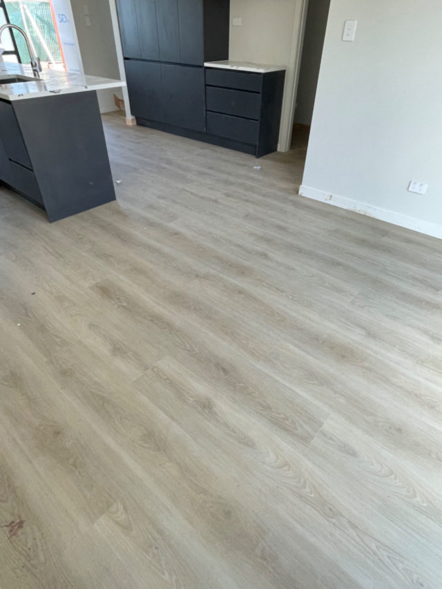 Sunlit Oak SPC Flooring Installation for Residential Spaces in Auckland